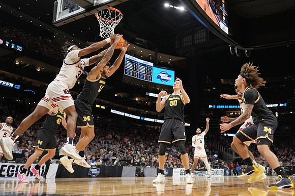 Will Tschetter (42), Roddy Gayle Jr. (11), Vladislav Goldin (50), and Tre Donaldson (3)