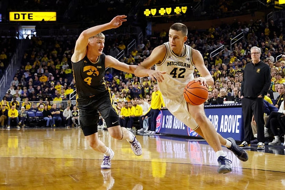 Will Tschetter (42) and Iowa Head Coach Fran McCaffery