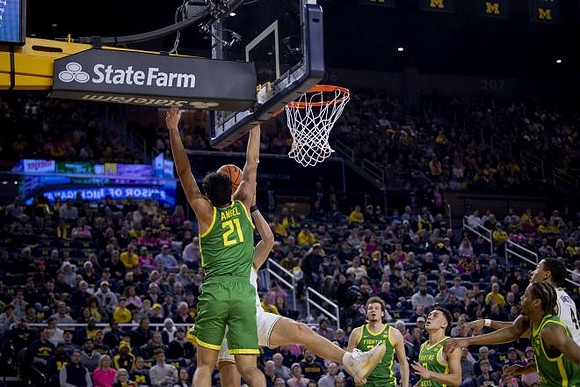 Will Tschetter (42) and Nimari Burnett (4)
