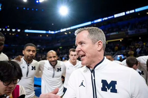 Dusty May and Michigan Team