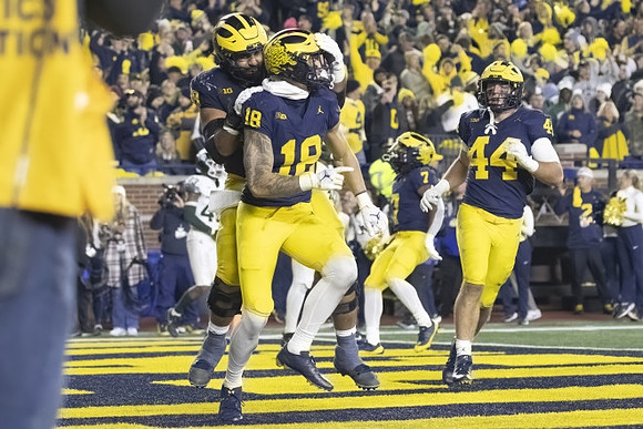 Giovanni El-Hadi (58), Colston Loveland (18), Max Bredeson (44), and Donovan Edwards (7)
