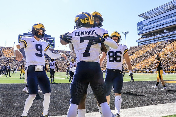 J.J. McCarthy (9), Donovan Edwards (7), and Luke Schoonmaker (86)