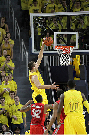 Mitch McGary (4) and Tim Hardaway Jr. (10)
