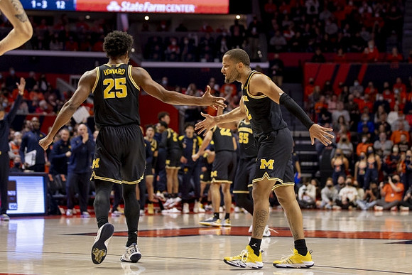 Jace Howard (25) and DeVante' Jones (12)