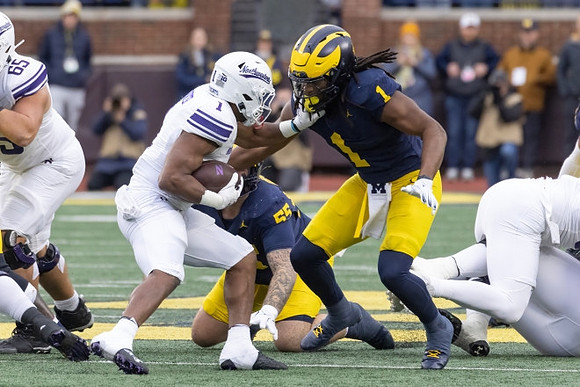 Mason Graham (55) and Jaishawn Barham (1)