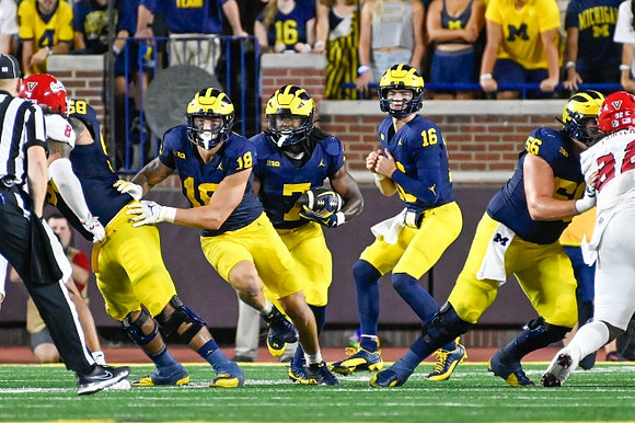 Giovanni El-Hadi (58), Colston Loveland (18), Donovan Edwards (7), Davis Warren (16), and Dominick Giudice (56)