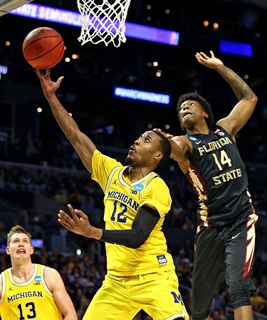 Moritz Wagner (13) and Muhammad-Ali Abdur-Rahkman (12)