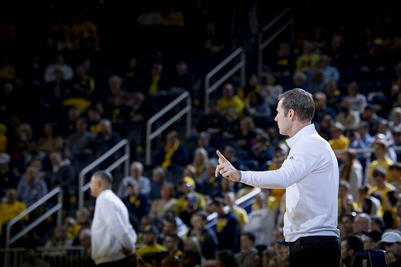 Juwan Howard and Nebraska Head Coach Fred Hoiberg