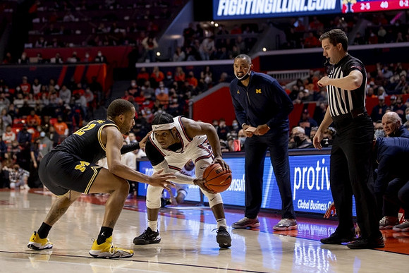 DeVante' Jones (12) and Juwan Howard