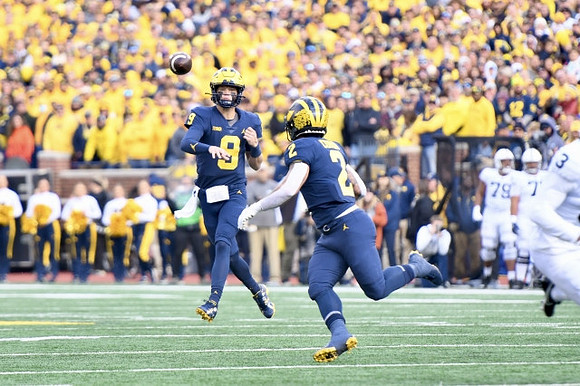 J.J. McCarthy (9) and Blake Corum (2)