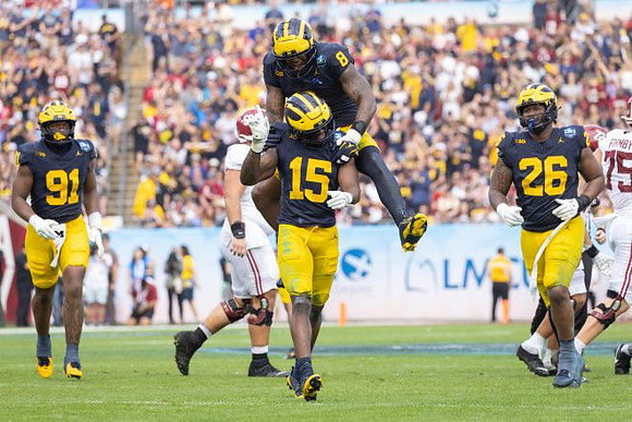 Cameron Brandt (91), Ernest Hausmann (15), Derrick Moore (8), and Rayshaun Benny (26)