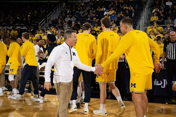 Dusty May and Michigan Team
