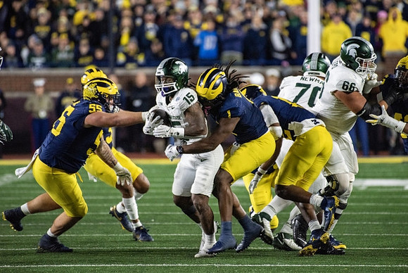 Mason Graham (55) and Jaishawn Barham (1)