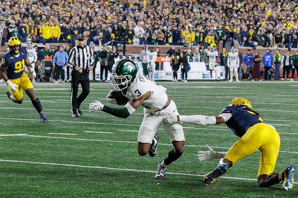 Cameron Brandt (91) and Makari Paige (7)