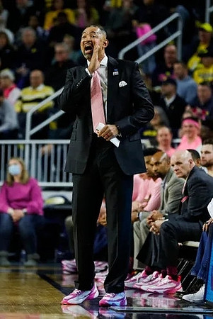 Juwan Howard, Saddi Washington, and Phil Martelli
