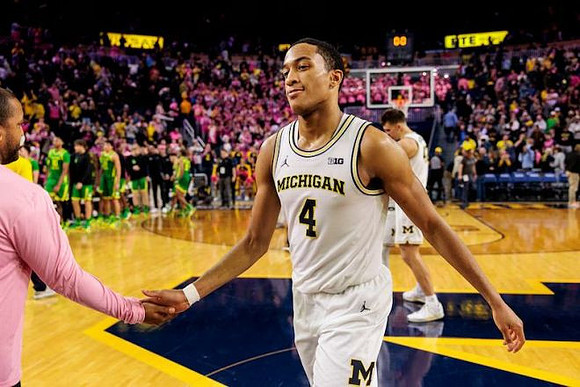 Nimari Burnett (4) and Will Tschetter (42)