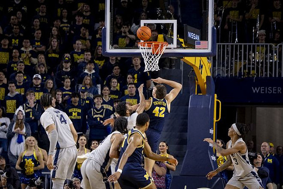 Nimari Burnett (4) and Will Tschetter (42)