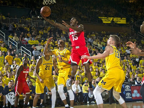 Zak Irvin (21), Muhammad-Ali Abdur-Rahkman (12), and Moritz Wagner (13)