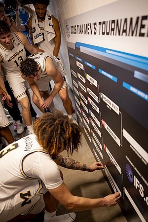 Tre Donaldson (3) and Michigan Team