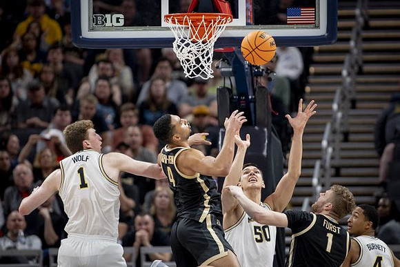 Danny Wolf (1), Vladislav Goldin (50), and Nimari Burnett (4)