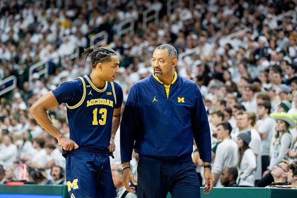 Jett Howard (13) and Juwan Howard