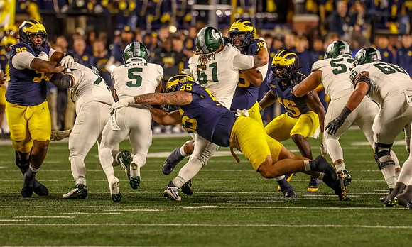 Trey Pierce (95), Mason Graham (55), Kenneth Grant (78), and Ernest Hausmann (15)
