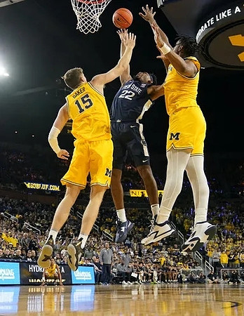 Joey Baker (15) and Tarris Reed Jr. (32)