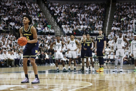 Kobe Bufkin (2), Joey Baker (15), Isaiah Barnes (11), and Hunter Dickinson (1)