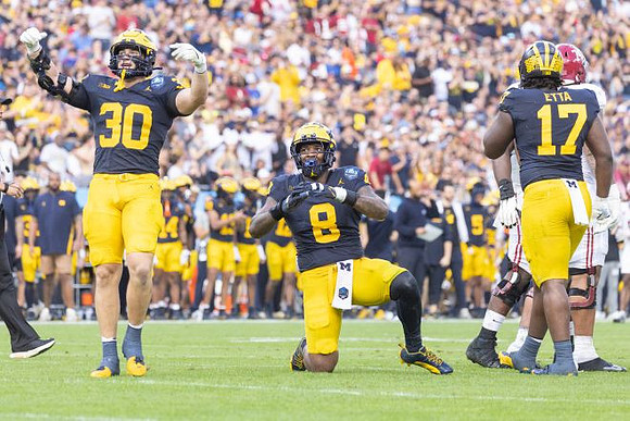 Jimmy Rolder (30), Derrick Moore (8), and Enow Etta (17)