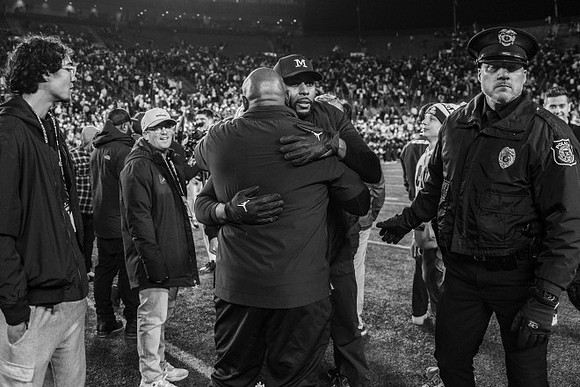 Tony Alford and Sherrone Moore