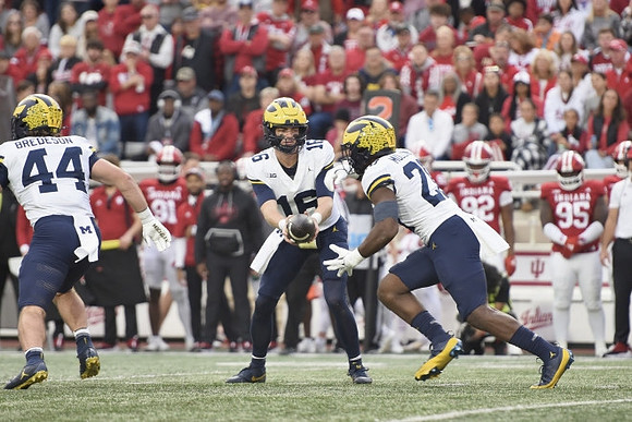 Max Bredeson (44), Davis Warren (16), and Kalel Mullings (20)