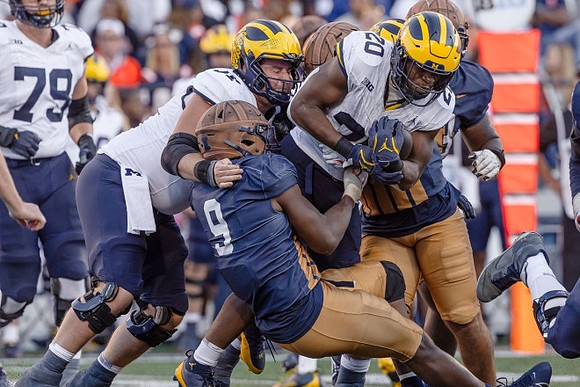 Kalel Mullings (20) and Jeffrey Persi (79)