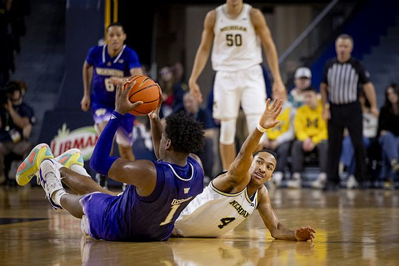 Nimari Burnett (4) and Vladislav Goldin (50)