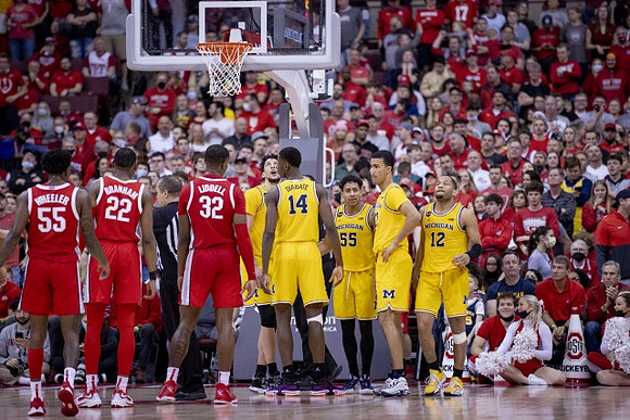 Brandon Johns Jr. (23), Moussa Diabate (14), Eli Brooks (55), Caleb Houstan (22), and DeVante' Jones (12)