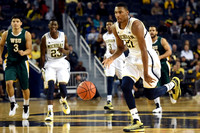 Caris LeVert (23), Kameron Chatman (3), and Zak Irvin (21)