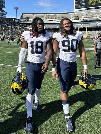Eyabi Anoma Okie (18) and Mike Morris (90)
