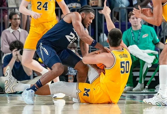 Sam Walters (24) and Vladislav Goldin (50)