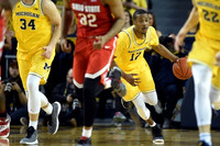 Mark Donnal (34), Muhammad-Ali Abdur-Rahkman (12), and Duncan Robinson (22)