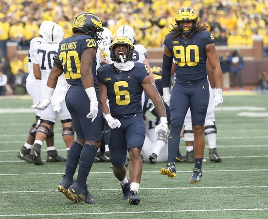Kalel Mullings (20), R.J. Moten (6), and Mike Morris (90)