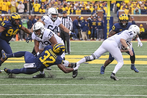 Kris Jenkins (94), Jaylen Harrell (32), and Michael Barrett (23)
