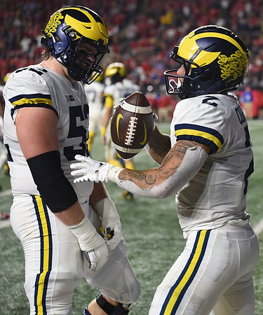 Karsen Barnhart (52) and Blake Corum (2)