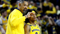 Juwan Howard and Dug McDaniel (0)