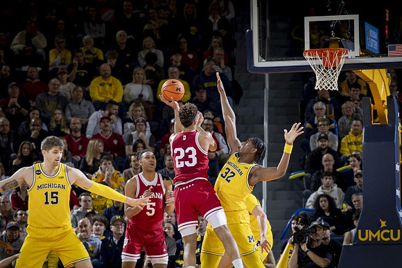 Joey Baker (15) and Tarris Reed Jr. (32)
