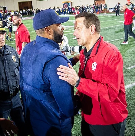 Sherrone Moore and Indiana Head Coach Curt Cignetti