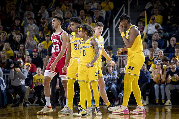 Kobe Bufkin (2), Dug McDaniel (0), Will Tschetter (42), and Tarris Reed Jr. (32)