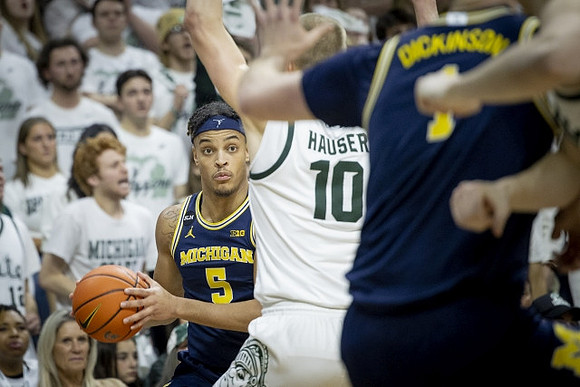 Terrance Williams II (5) and Hunter Dickinson (1)