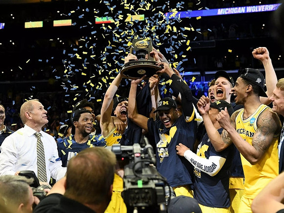John Beilein, Michigan Team, and West Regional Championship Trophy