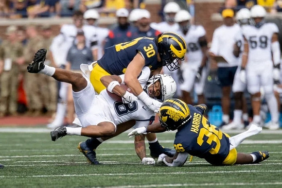 Jimmy Rolder (30) and Keshaun Harris (36)