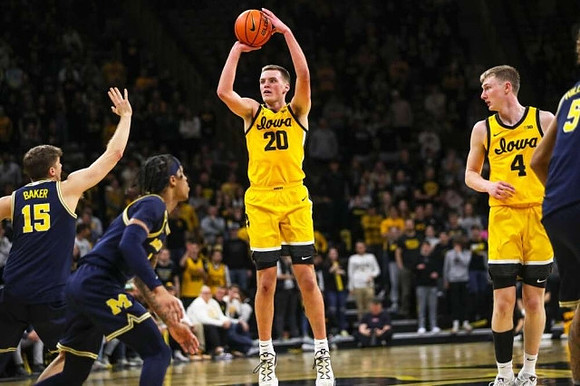 Joey Baker (15) and Dug McDaniel (0)
