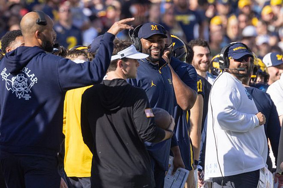 Sherrone Moore and Michigan Team